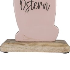 Wooden decorative rabbit FROHE OSTERN, standing, with bow, 32x16x5cm, light pink