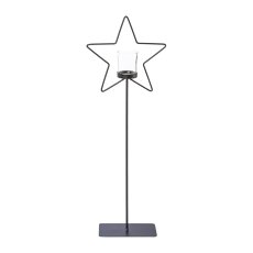 Metal star on base,candle